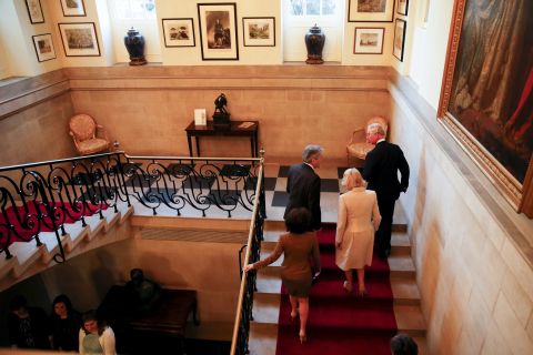 The royal couple is accompanied by Peter Westmacott, British ambassador to the United States, as they arrive at his residence on March 17.