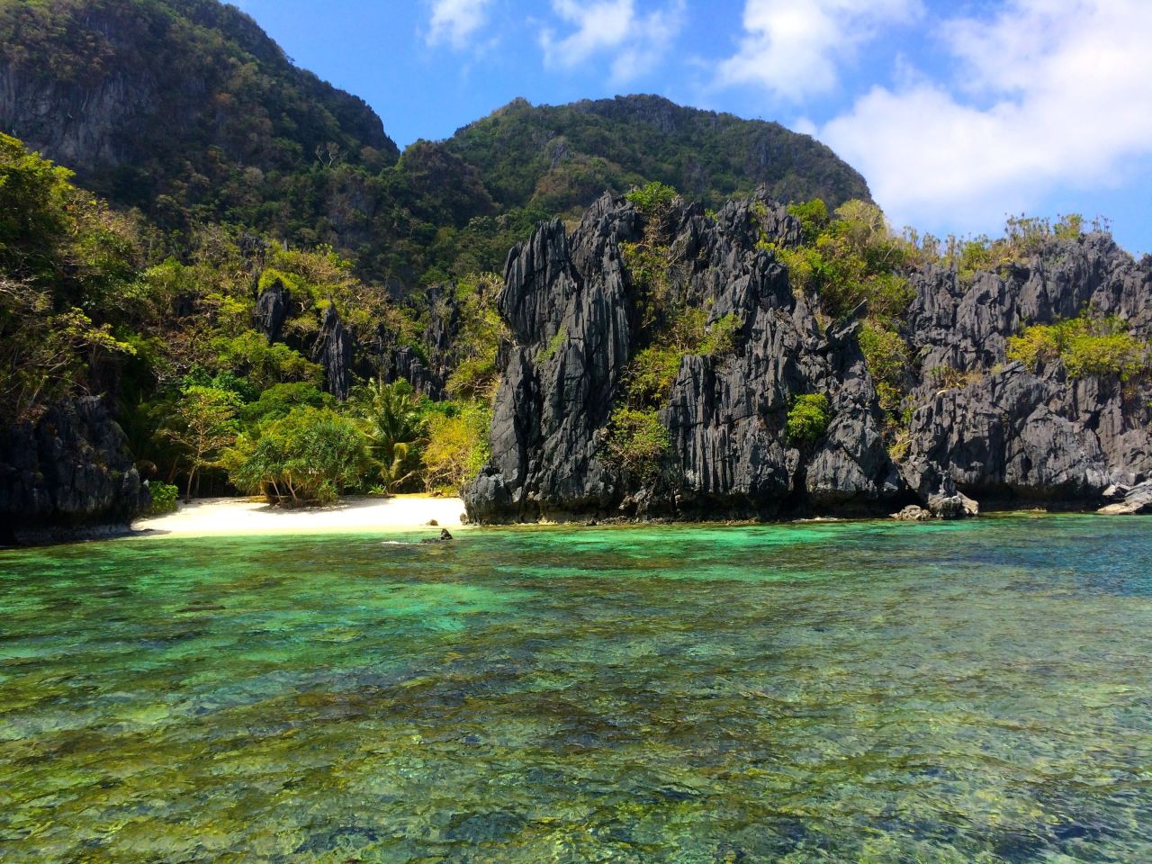 <a href="http://ireport.cnn.com/docs/DOC-1220098">Jonathan Baker</a>, 30, quit his job in aviation and logistics to travel the world. He took this shot of Paradise Beach near El Nido, Palawan. Palawan, the most southwestern large island of the Philippines, is surrounded by some 1,800 smaller islands and islets, including the lovely Bacuit Archipelago, where this shot was taken.<br />