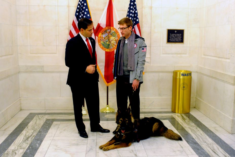 Paralympian Brad Snyder poses with Rubio during a Team USA Congressional visit in November 2013.