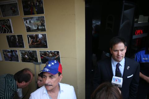 Rubio speaks to the media at the Doral restaurant in April 2014.