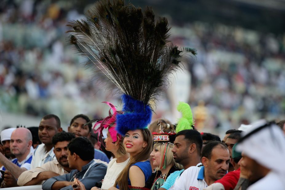 The stakes are high, so are the fashion ones -- typified by this peacock-inspired head dress.