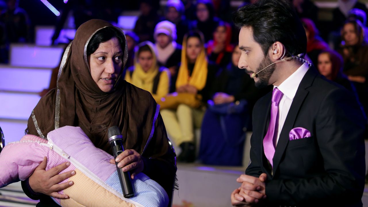 An Afghan woman shared her story of having a hard time feeding her children on "Afghan Star" on International Women's Day as part of a fund-raising effort.  