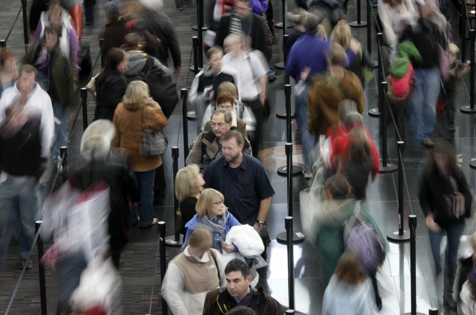 People at security lines in Denver International Airport. The SPOT program officers typically spend less than 30 seconds scanning an average passenger for over 90 behaviors that the TSA say are linked to stress, fear or deception.  