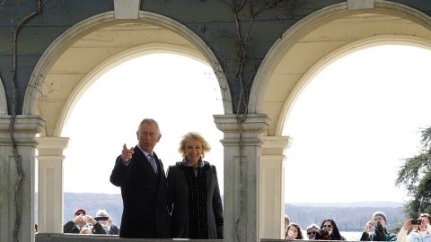Charles and Camilla walk down a colonnade during a visit to Mount Vernon, Virginia, on Wednesday, March 18. Mount Vernon was the home of President George Washington.
