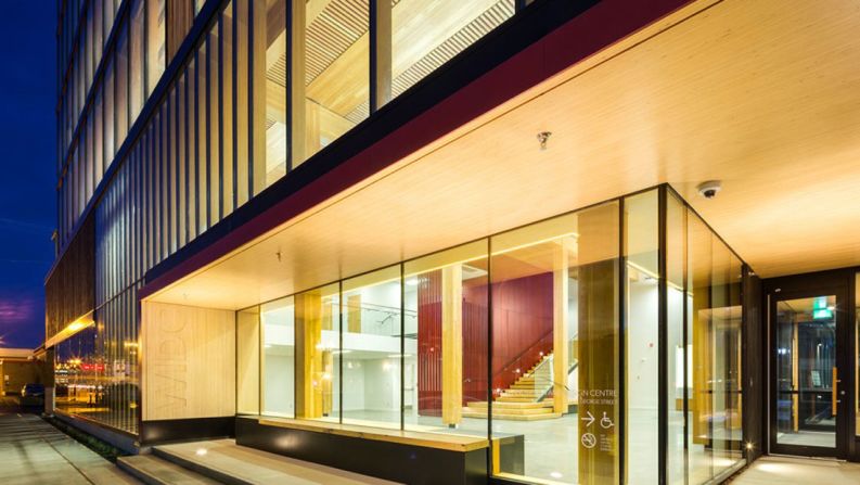A ground floor entrance of the Wood Innovation and Design Center in Prince George. The building is part of the University of Northern British Columbia campus.