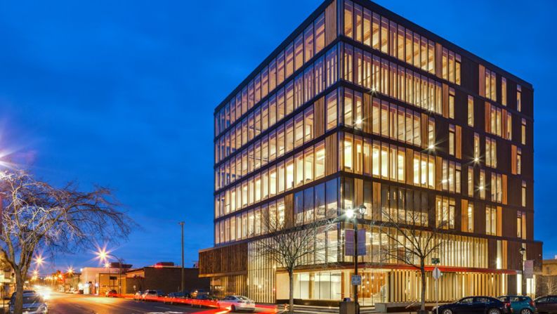 This six-story building with a ground floor mezzanine and a rooftop mechanical penthouse won the 2016 Governor General's Medal in Architecture. Designed with CLT floor panels, Glulam beams and mass timber walls, there is no concrete used in the building above the ground floor slab. 