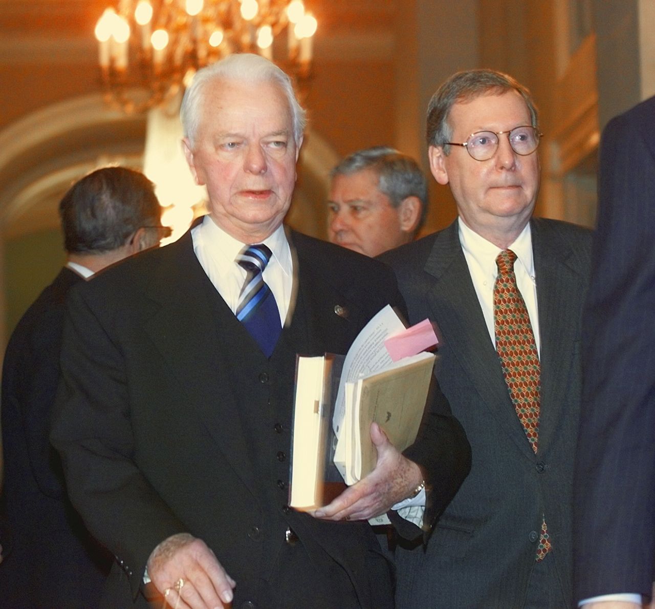 Sen. Robert Byrd, D-West Virginia, and McConnell enter the "Old Senate Chamber" in January 1999 to attend a bipartisan caucus to possibly establish rules and guidelines for the impeachment trial of President Bill Clinton.
