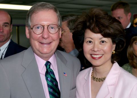 McConnell poses with wife Elaine Chao at the 128th running of the Kentucky Derby at Churchill Downs in Louisville in May 2002.