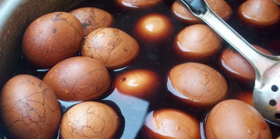 Boiled eggs are simmered in a broth made with soy sauce, tea bags, cinnamon, aniseed and rock sugar. The eggs with cracks on the shell are the most flavorful.