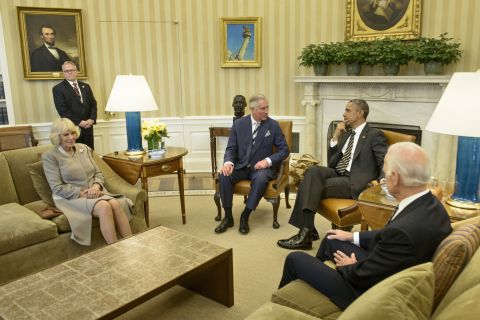Britain's Prince Charles and his wife, Duchess Camilla, visit President Barack Obama and Vice President Joe Biden in the White House Oval Office on March 19.