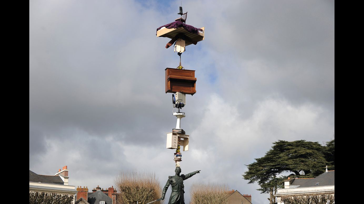 A work by Japanese artist Tatzu Nishi is seen above the statue of French General Emile Mellinet in Nantes, France, on Friday, March 13. The city is hosting an art festival from July 3 to August 30.