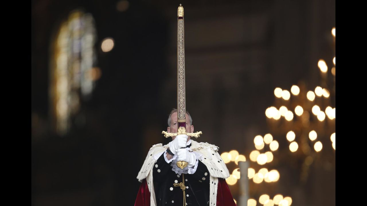 An official exits St. Paul's Cathedral in London following a service Friday, March 13, that paid tribute to military members who served in Afghanistan.