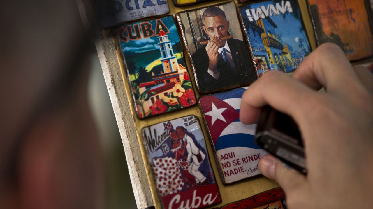 A person looks at magnets inside a souvenir shop in Havana, Cuba, on Monday, March 16. <a href="http://www.cnn.com/2015/03/13/world/gallery/week-in-photos-0313/index.html" target="_blank">See last week in 32 photos</a>