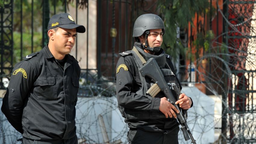 Tunisian security forces stand guard outside the National Bardo Museum in Tunis on March 19, 2015, in the aftermath of an attack on foreign tourists. Tunisia's president promised to wage a 'merciless war against terrorism' after gunmen killed at least 17 foreign tourists and two Tunisians in a daylight attack in the birthplace of the Arab Spring.