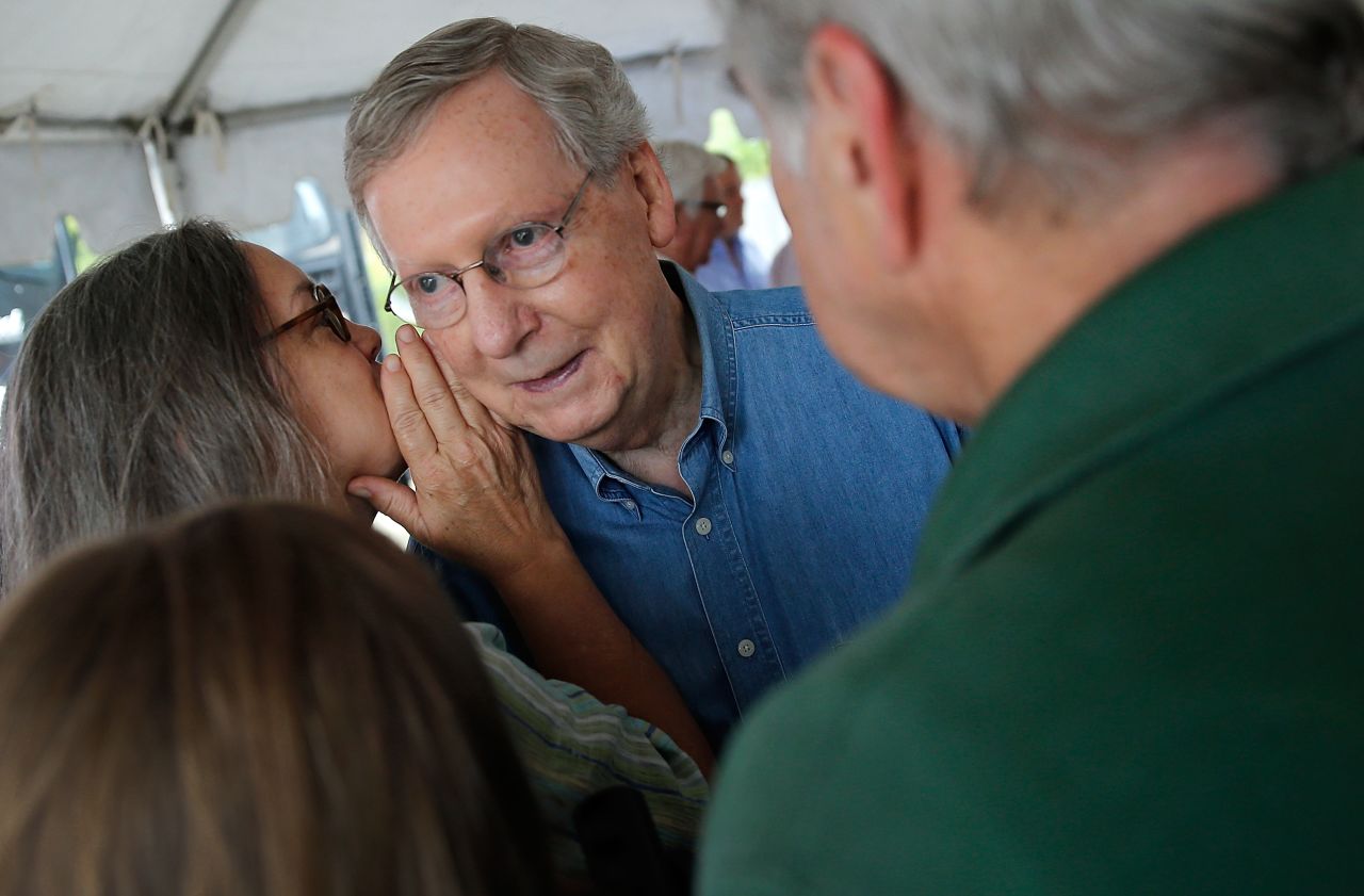 McConnell talks with supporters at a campaign rally in Hindman, Kentucky, during a two-day bus tour of the eastern part of the state in August 2014.