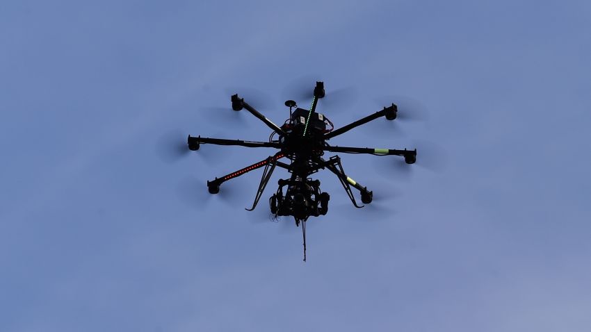 A drone camera flies in the sky during the Nordic Combined HS100 Normal Hill Ski Jumping team event during the FIS Nordic World Ski Championships at the Lugnet venue on February 22, 2015.