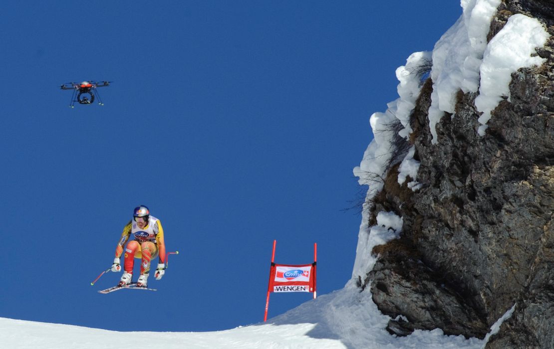 A drone camera hovers above Canada's Erik Guay competes during the 2014 FIS World Cup Men's Downhill in Wengen, Switzerland. 