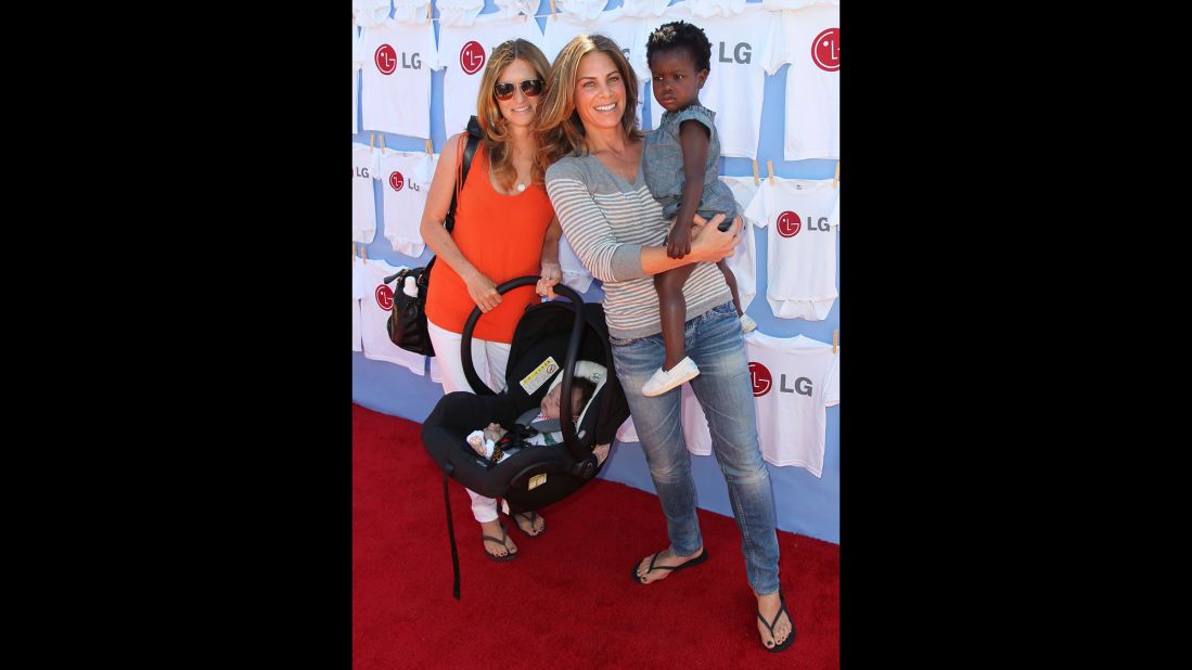"Biggest Loser" trainer and television personality Jillian Michaels, center, partner Heidi Rhoades and their son Phoenix and daughter Lukensia attend a 2012 event in Beverly Hills.
