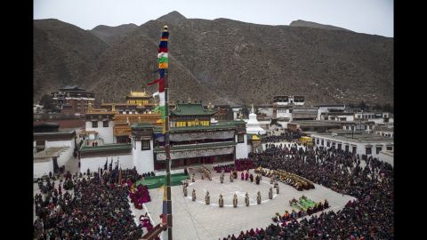 Tibetan Buddhist monks perform a mask dance  on March 4, 2015.