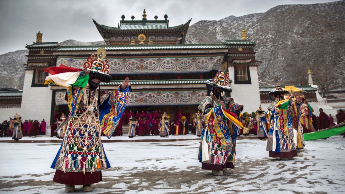 Tibetan Buddhist monks perform a "black hat" dance during Monlam, the "Great Prayer" rituals on March 4, 2015.