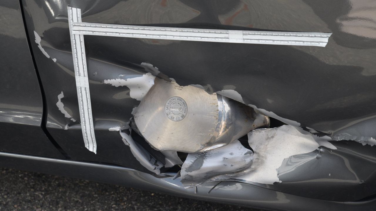 The pressure cooker was embedded in the side of a resident's Honda.