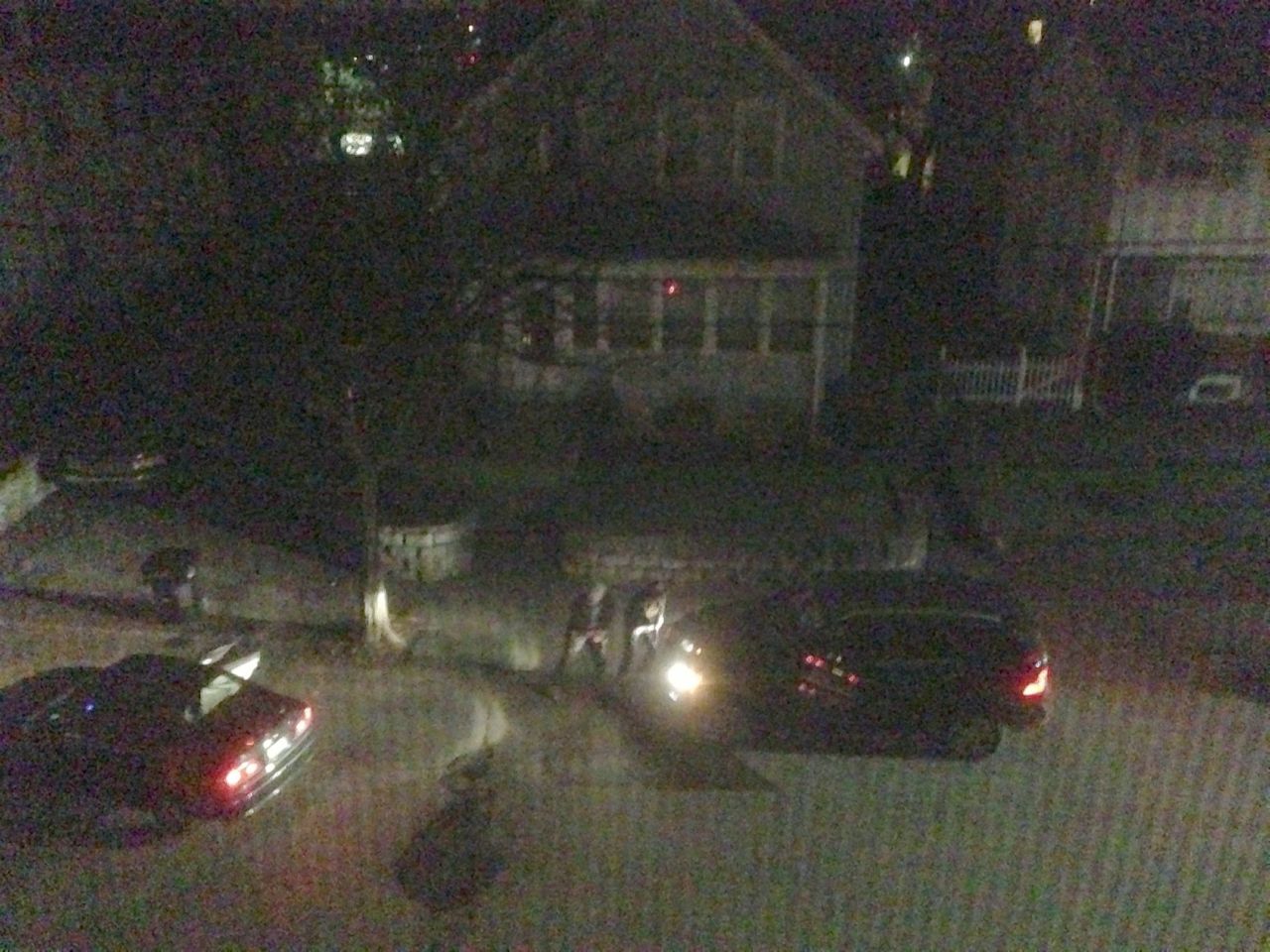 Photos of the Watertown shootout were entered into evidence. Neighbors came to their windows and then retreated. One grabbed his infant son and headed toward the back of his house with his wife. Another grabbed a camera and took photographs from an upstairs window.