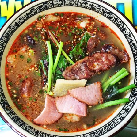 This dish is perfectly summed up by its name -- ma la tang means "numb, spicy, boiling hot." You can choose your ingredients -- meatballs, meat fillets, greens, tofu, all sorts of noodle -- and the chef will boil them in a large communal pot of one of the spiciest stocks you'll ever taste.