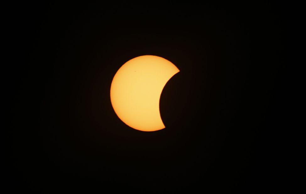An eclipse is darkening parts of Europe on Friday in a rare solar event that won't be repeated for more than a decade. 