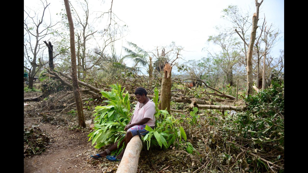 A woman sits on a fallen tree among what's left of her garden in Port Vila, Vanuatu, on Thursday, March 19, nearly a week after Cyclone Pam ripped through the island nation in the South Pacific. <a href="http://www.cnn.com/2015/03/17/asia/cyclone-pam-vanuatu/">Vanuatu President Baldwin Lonsdale has called the storm a "monster,"</a> saying it has set back the development of his country, already one of the poorest in the region, by years. 
