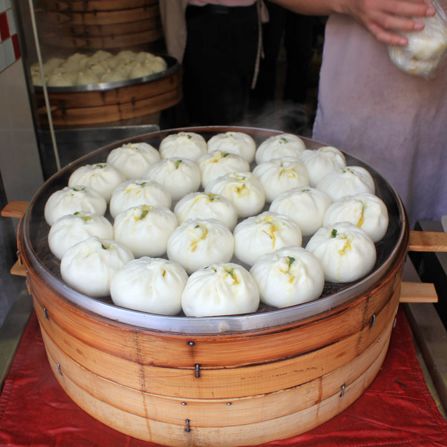 Known as man tou, these soft and puffy buns can have a variety of fillings. Traditional options include minced pork, chopped vegetables and red bean paste.