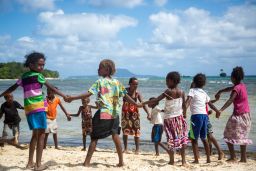 Children play on the beach on Mota Lava.