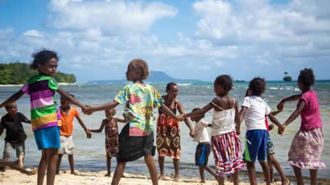 Children play on the beach on Mota Lava.