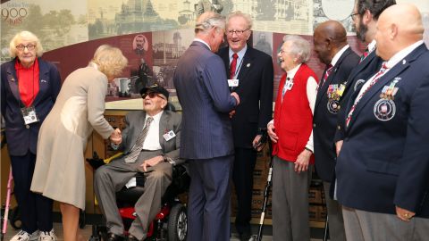 The royal couple talk to veterans during a visit to an armed forces retirement home in Washington, D.C. on Thursday, March 19.