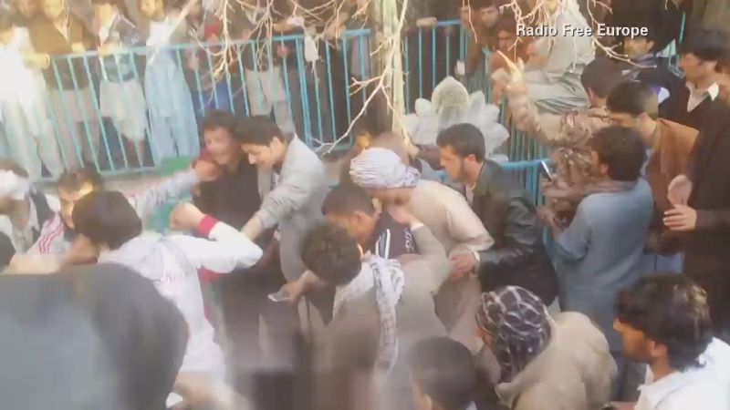 Afghan woman beaten to death by crowd