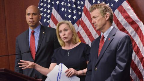 From left, U.S. Sens. Cory Booker, Kirsten Gillibrand and Paul attend a March 2014 news conference to announce a new medical marijuana bill at the U.S. Capitol in Washington.