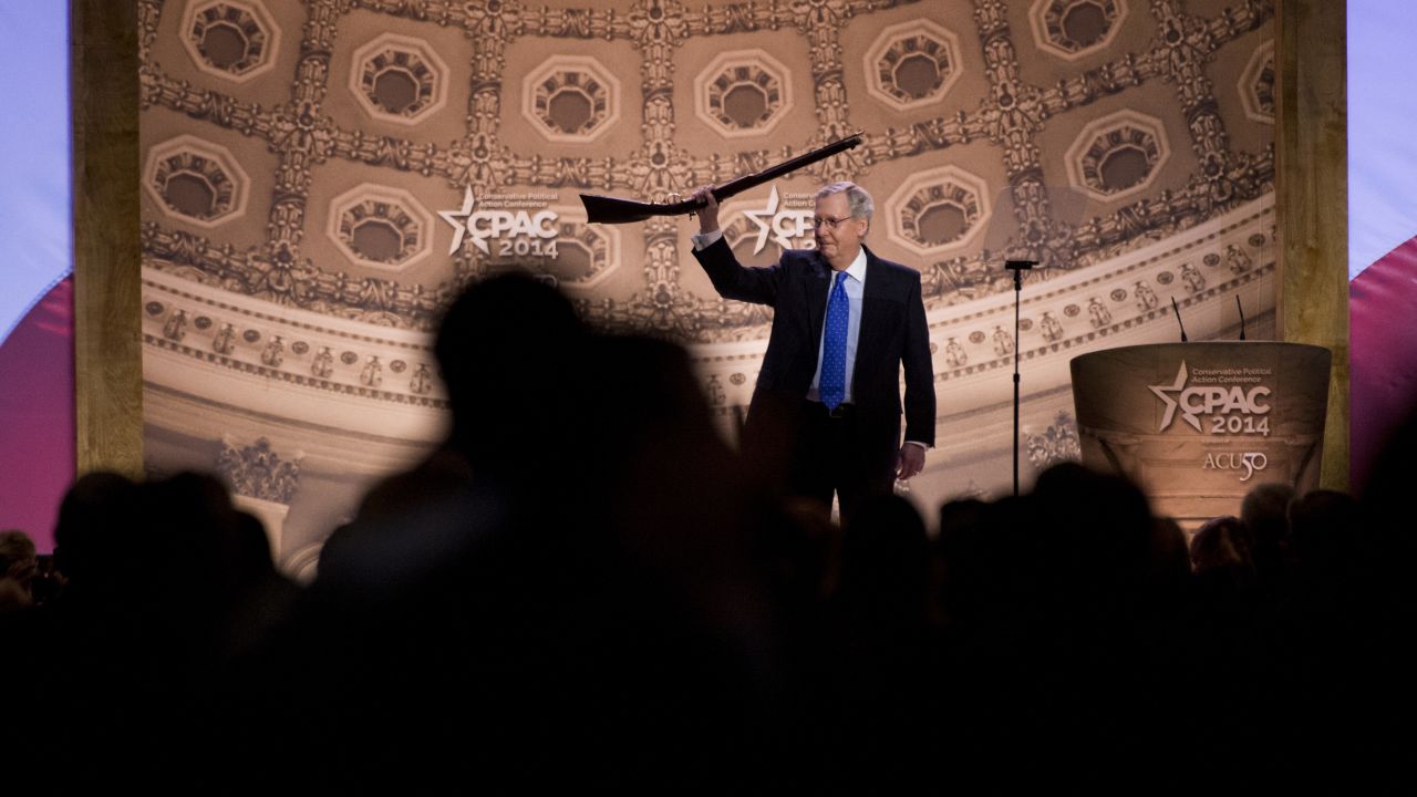 McConnell carries a musket onstage before his speech during the American Conservative Union's Conservative Political Action Conference (CPAC) in National Harbor, Maryland, in March 2014.