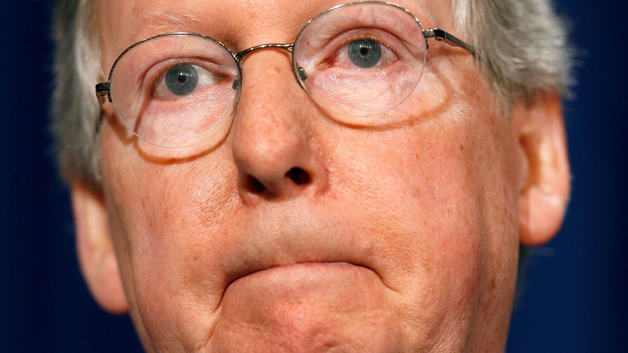 McConnell answers questions from reporters at the Capitol in September 2007.