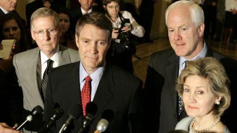 Then-Senate Majority Leader Bill Frist, R-Tennessee, center, is flanked by McConnell, Sen. John Cornyn, R-Texas, and then-Sen. Kay Bailey Hutchinson, R-Texas, as he speaks to reporters after a Senate vote in May 2005.