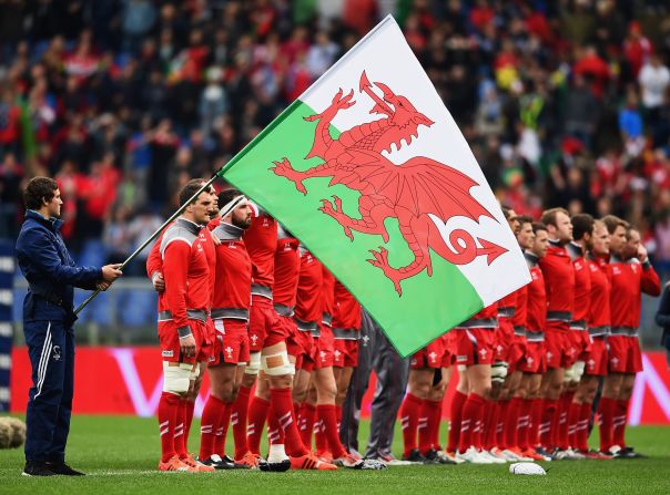 Wales and Italy line up before rugby's Six Nations "Super Saturday" at the Stadio Olimpico in Rome. Four teams (Wales, England, Ireland and France) went into the final round of fixtures with hopes of winning the northern hemisphere's premiere international rugby tournament. <br /><br />And with the Welsh, English and Irish all having won the same number of matches at the start of play, the title was likely go to the team that could secure the best points differential over the course of the tournament.<br /><br />England started the day on + 37, Ireland was second on +33 while Wales was third on +12. The scene was set the scene for a dramatic, closely-fought points-fest.