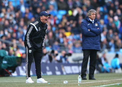 West Brom manager Tony Pulis (foreground) was unimpressed after Swarbrick appeared to punish the wrong player, the second time such an incident has occurred in an EPL match in less than a month.