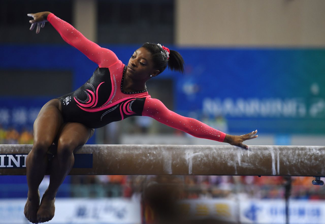 Teenage world champion gymnast Simone Biles is another American forecast to reach the podium, picking up 'multiple medals' in artistic gymnastics.
