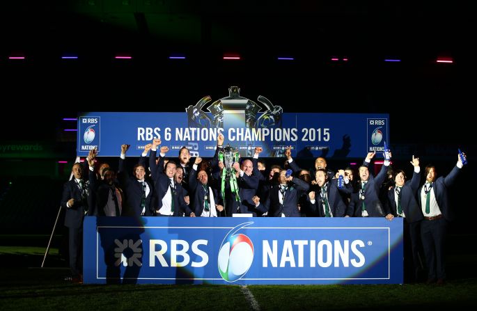 Ireland players reappeared suited and booted on the Murrayfield pitch to accept the Six Nations trophy which they claim by virtue of a slender points differential of +63 points compared to Englands +57.