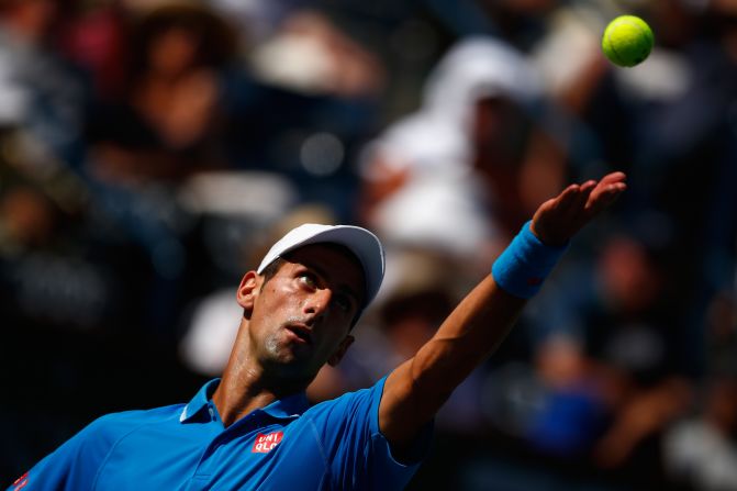 Novak Djokovic serves during his comfortable semifinal victory over Andy Murray at Indian Wells.