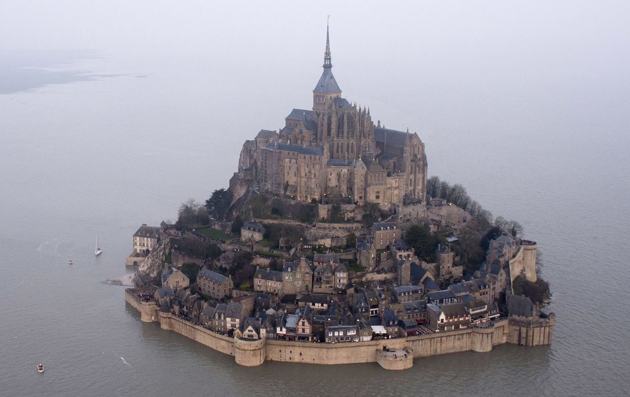 Billed as "the tide of the century," the water rose more than 13 meters, covering a new walkway used to access to the island which is around 600 meters from the mainland.