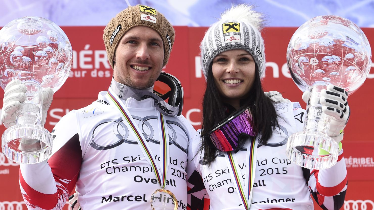 Austrians Marcel Hirscher and Anna Fenninger celebrate their overall World Cup skiing triumphs.