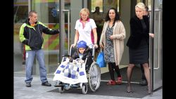 A medic wheels 5 year old Ashya King to an ambulance car in October 2014 in Prague.