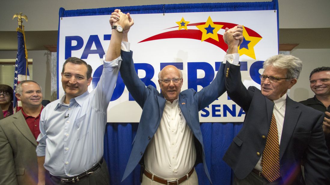 U.S. Sen. Pat Roberts, center, is joined by Cruz and former Sen. Tom Coburn at a rally in WIchita, Kansas, in October.