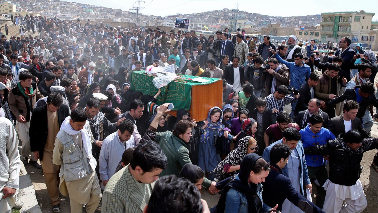 Afghan women rights activists carry the coffin of 27-year-old Farkhunda, an Afghan woman who was beaten to death by a mob.
