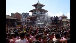 Nepalese revellers gather in celebration of the Holi festival in Kathmandu on March 5, 2015. The Holi festival of colours is a riotous celebration of the coming of spring and falls on the day of the full moon in March every year.   (Photo credit: PRAKASH MATHEMA/AFP/Getty Images)
