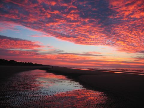 <a href="http://ireport.cnn.com/docs/DOC-1220413">Betsey Porter</a>, who lives in Bloomington, Minnesota, was visiting her parents at their vacation home on Kiawah Island when she captured this fiery sunrise. "I could not believe such a place existed when I went the first time 10 years ago.  If you are a golfer or a foodie or a beach or nature lover, you can't find a better spot than this," she wrote. 